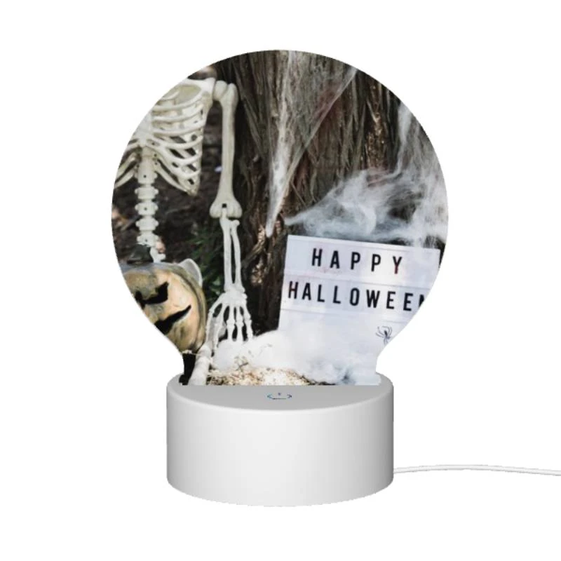 Round Acrylic Night Light, A skeleton and a pumpkin are placed next to a sign that reads "Happy Halloween." Round Acrylic Night Light, A Skeleton And A Pumpkin Are Placed Next To A Sign That Reads "Happy Halloween." -Acrylic Night Light Shop b68fcd8147872bc0aeb2164a21a6523b482737d7