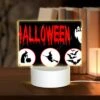 Rectangular Acrylic Night Light, A Halloween Sign With Four Different Images Of Witches And Bats.