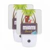 Night Light Set Of 2, A Sign For Miami Beach With A Beach Ball And A Suitcase.