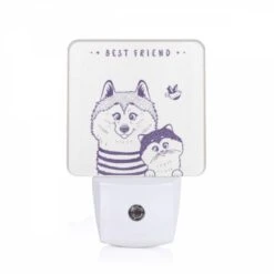 Night Light, A Cat And A Dog Are Sitting Next To Each Other.