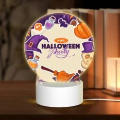 Round Acrylic Night Light, A Colorful Poster Advertising A Halloween Party.