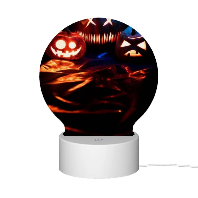 Round Acrylic Night Light, Three pumpkins with faces carved into them are sitting on a table. Round Acrylic Night Light, Three Pumpkins With Faces Carved Into Them Are Sitting On A Table. -Acrylic Night Light Shop ceac8693e259630d2f681e08d8be59b8bdccb00a
