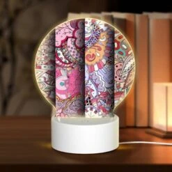 Round Acrylic Night Light, Three Colorful Designs Of A Clock Are Displayed.