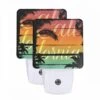 Night Light Set Of 2, A Colorful Sunset Over The Ocean With The Word California Written In The Sky.
