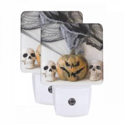Night Light Set Of 2, Three Skulls Are Placed Next To A Pumpkin.