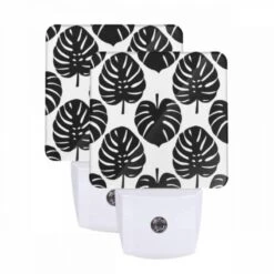 Night Light Set Of 2, A Pattern Of Leaves On A Black And White Background.