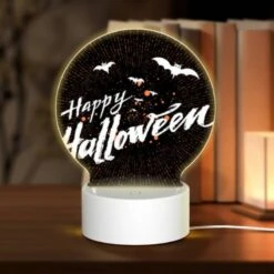 Round Acrylic Night Light, A Black And White Image Of Bats And The Words "Happy Halloween" Written In Orange.