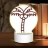 Round Acrylic Night Light, A Brown And White Drawing Of A Palm Tree.