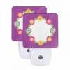 Night Light Set Of 2, A Purple Background With A Yellow Sunflower Design.