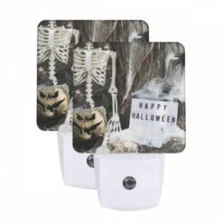 Night Light Set Of 2, A Skeleton And A Pumpkin Are Placed Next To A Sign That Reads "Happy Halloween."