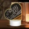 Love Acrylic Night Light, A Chalkboard With The Words "Happy Halloween" Written On It.